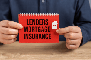 Person holding a red notebook labelled Lenders Mortgage Insurance, representing guidance for first home buyers and homeowners on LMI costs and requirements.