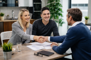 First home buyers meeting with a mortgage broker to understand the benefits of using a broker for their first home purchase