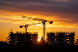 Progress payment stages in an Australian construction project showing cranes and buildings during a progressive payment build process