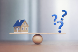 Illustration showing a house balanced against question marks representing the decision between fixed vs variable home loans in Australia